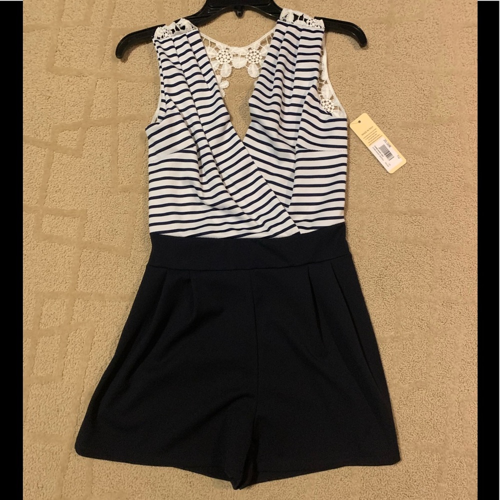 White and navy romper from France